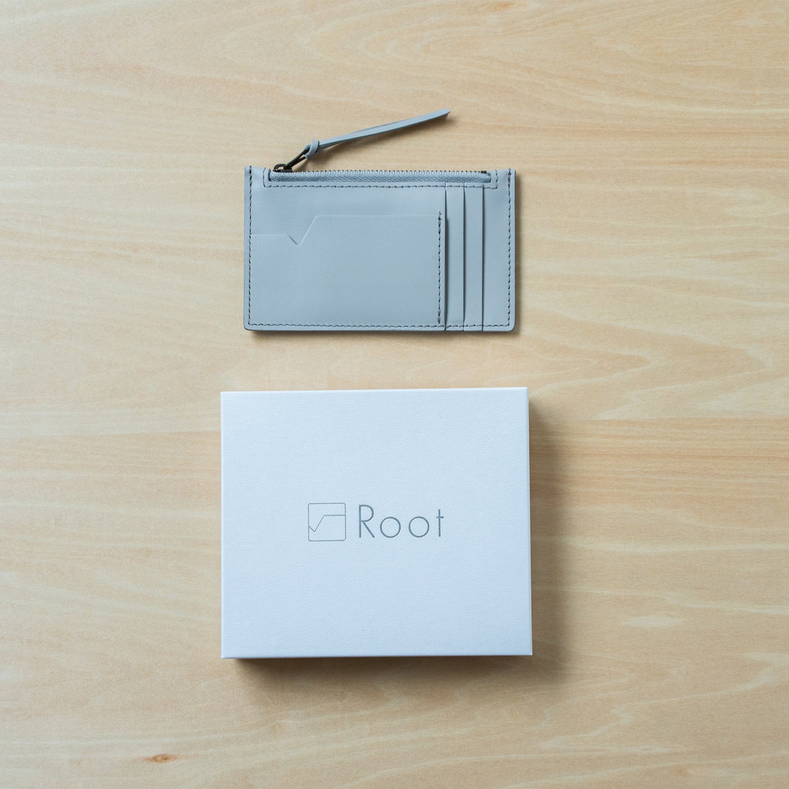 Root <UNISEX>Fragment case(本革フラグメントケース)